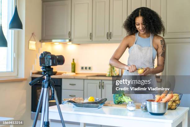 preparing vegetables for e-learning cookery course - tripod fish stock pictures, royalty-free photos & images