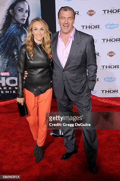 Actor Ray Stevenson and wife Elisabetta Caraccia arrive at the Los Angeles premiere of "Thor: The Dark World" at the El Capitan Theatre on November...