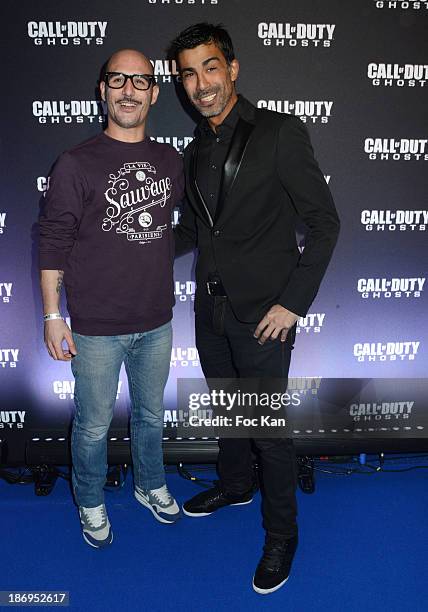 Cartman and Miko attend the 'Call of Duty: Ghosts' Game launch party at the Yoyo Palais de Tokyo on November 4, 2013 in Paris, France.