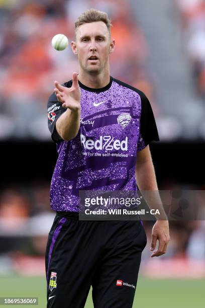 Billy Stanlake of the Hurricanes receives the ball during the BBL match between Perth Scorchers and Hobart Hurricanes at Optus Stadium, on December...