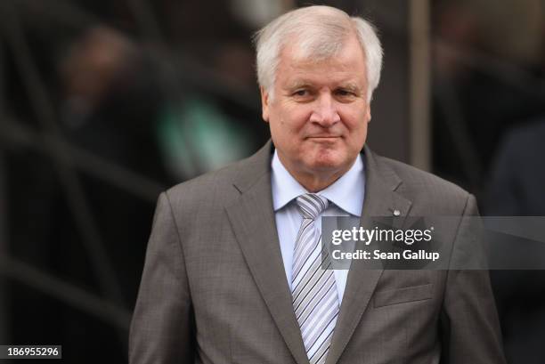 Horst Seehofer, Chairman of the Bavarian Christian Democrats , waits for the arrival of the heads of the German Social Democrats and German Christian...