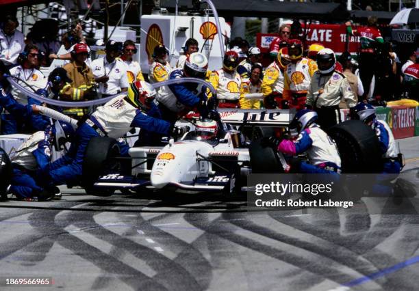 Max Papis of Italy, driver the Miller LiteTeam Rahal Reynard 2KI Ford Cosworth XF makes a pitstop for refueling and tyres during the Championship...