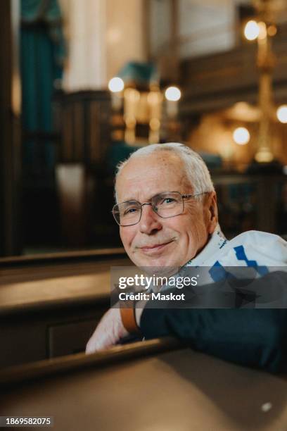 portrait of smiling elderly man at synagogue - jewish prayer shawl stock pictures, royalty-free photos & images