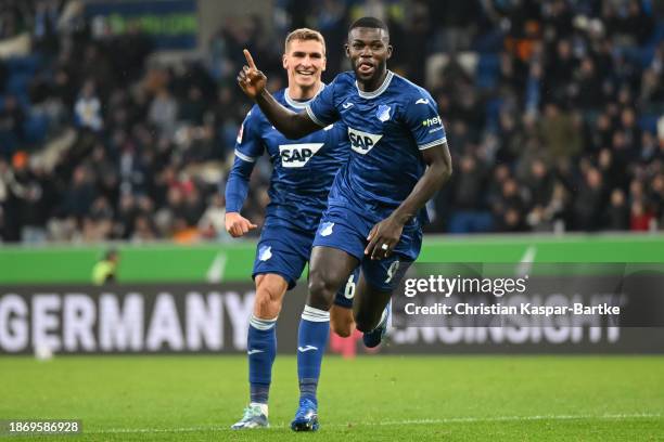 Ihlas Bebou of TSG 1899 Hoffenheim celebrates after scoring his team’s third goal during the Bundesliga match between TSG Hoffenheim and SV Darmstadt...