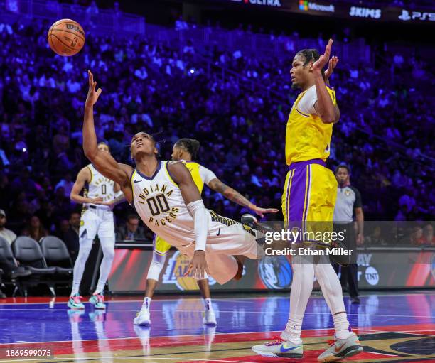 Bennedict Mathurin of the Indiana Pacers shoots after being fouled by Cam Reddish of the Los Angeles Lakers in the fourth quarter of the championship...