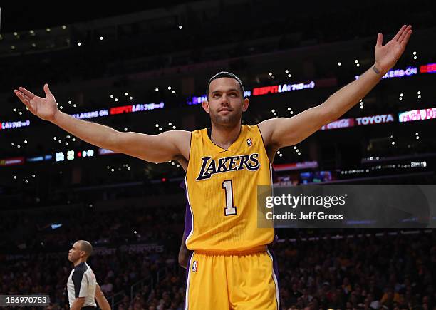 Jordan Farmar of the Los Angeles Lakers gestures against the Los Angeles Clippers at Staples Center on October 29, 2013 in Los Angeles, California....