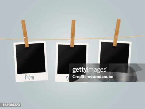 Vector clothes pegs hanging blank photo frames - family concept Vector clothes pegs hanging blank photo frames - family concept