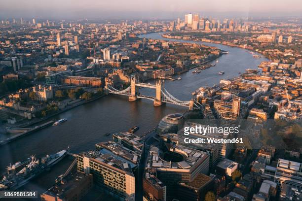 city of london with thames river at sunset - aerial shots stock pictures, royalty-free photos & images