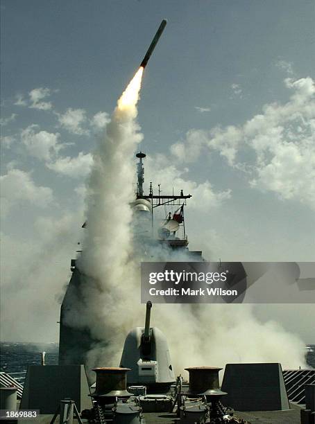 Tomahawk cruise missile flies toward Iraq after being launched from the AEGIS guided missile cruiser USS San Jacinto March 25, 2003 in the Red Sea.