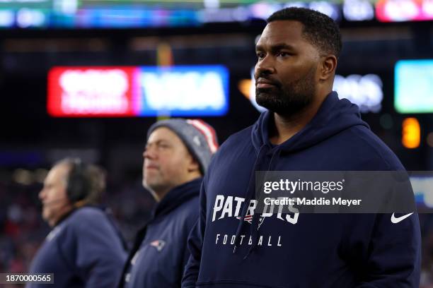 New England Patriots linebackers coach Jerod Mayo looks on from the sideline next to head coach Bill Belichik during the game against the Kansas City...