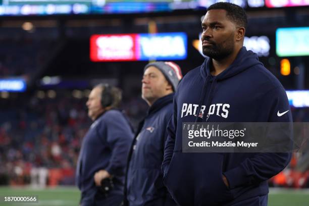 New England Patriots linebackers coach Jerod Mayo looks on from the sideline next to head coach Bill Belichik during the game against the Kansas City...