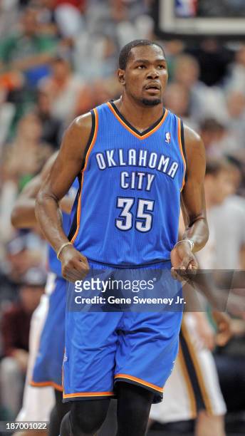 Kevin Durant of the Oklahoma City Thunder runs up court during their game against the Utah Jazz at EnergySolutions Arena October 30, 2013 in Salt...