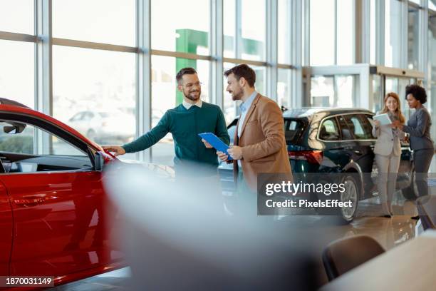 car showroom - automobile industry stock pictures, royalty-free photos & images