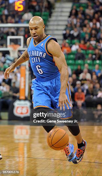 Derek Fisher of the Oklahoma City Thunder dribbles up court during their game against the Utah Jazz at EnergySolutions Arena October 30, 2013 in Salt...