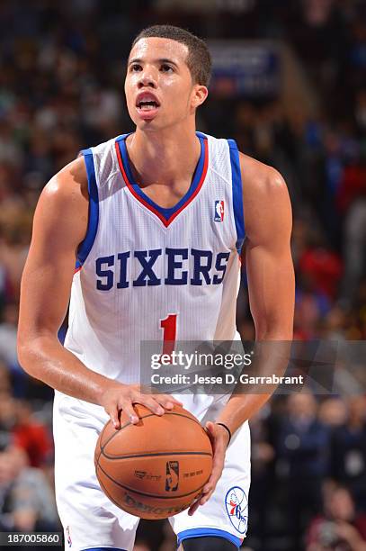 Michael Carter-Williams of the Philadelphia 76ers shoots a foul shot against the Miami Heat at the Wells Fargo Center on October 30, 2013 in...