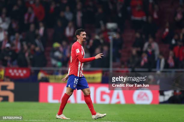 Stefan Savic of Atletico Madrid leaves the field dejected after being shown a red card by Referee Jose Luis Munuera Montero during the LaLiga EA...