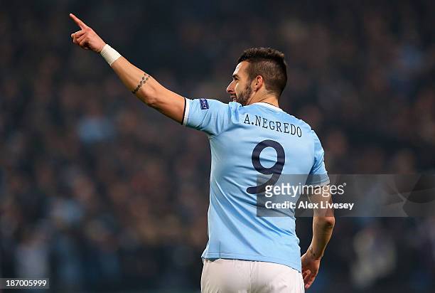 Alvaro Negredo of Manchester City celebrates scoring the fourth goal during the UEFA Champions League Group D match between Manchester City and CSKA...