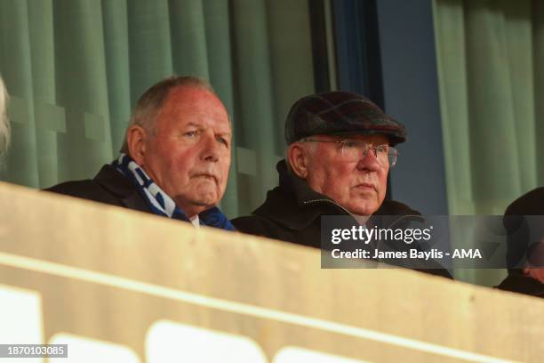 Barry Fry director of football at Peterborough United watches the game with Sir Alex Ferguson during the Sky Bet League One match between Shrewsbury...