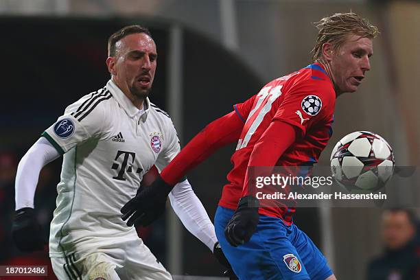 Franck Ribery of Bayern Muenchen battles for the ball with Frantisek Rajtoral of Plzen during the UEFA Champions League group D match between FC...