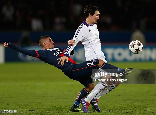 Marco Verratti of PSG tackles Sacha Kljestan of Anderlect during the UEFA Champions League Group C match between Paris Saint Germain and RSC...