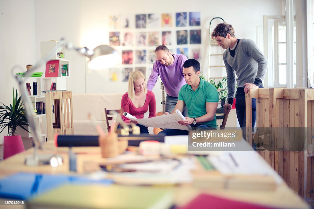 Group of architects discussing in an office