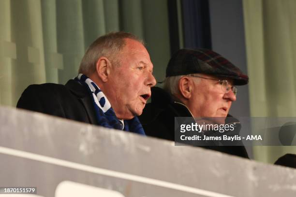Barry Fry director of football at Peterborough United watches the game with Sir Alex Ferguson during the Sky Bet League One match between Shrewsbury...