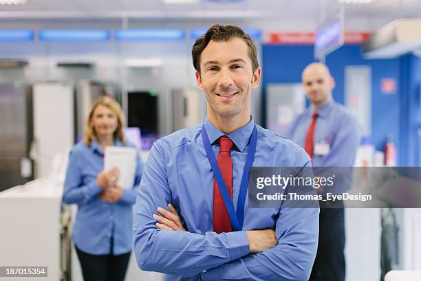 portrait of salesman in retail store - appliance shop stock pictures, royalty-free photos & images