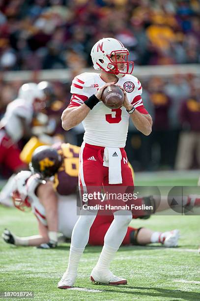 Taylor Martinez of the Nebraska Cornhuskers looks to pass the ball during the game against the Minnesota Golden Gophers on October 26, 2013 at TCF...