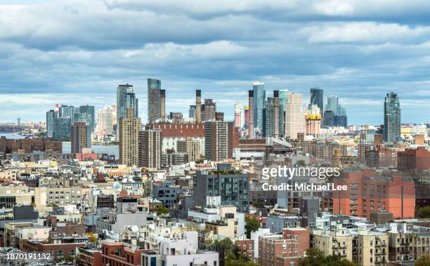 aerial view of east village and queens, new york - new york vacation rooftop stock pictures, royalty-free photos & images