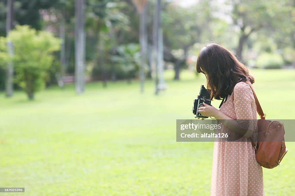 Girl with vintage camera