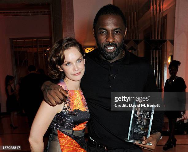 Ruth Wilson and Idris Elba, winner of the Man of the Year award, attend the Harper's Bazaar Women of the Year awards at Claridge's Hotel on November...