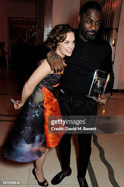 Ruth Wilson and Idris Elba, winner of the Man of the Year award, attend the Harper's Bazaar Women of the Year awards at Claridge's Hotel on November...