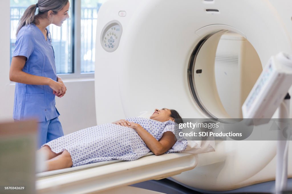 Ct Scan Radiographer Radiographer Gives Instructions To Patient Prior To Ct Scan High-Res ...