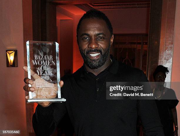 Idris Elba, winner of the Man of the Year award, attends the Harper's Bazaar Women of the Year awards at Claridge's Hotel on November 5, 2013 in...