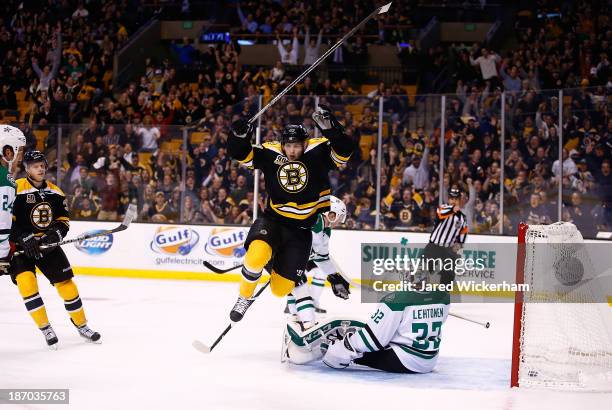 Torey Krug of the Boston Bruins celebrates his goal in the first period in front of Kari Lehtonen of the Dallas Stars at TD Garden on November 5,...