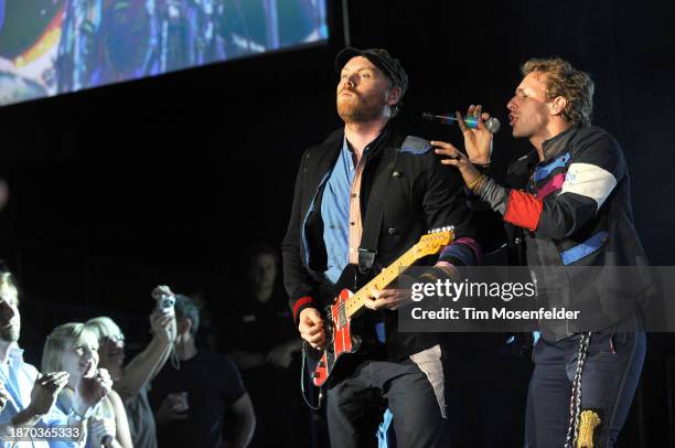 Jonny Buckland and Chris Martin of Coldplay perform at Shoreline Amphitheatre on July 13, 2009 in Mountain View, California.