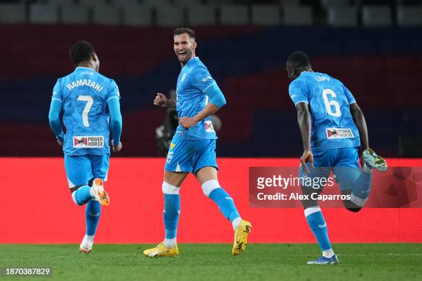 Leo Baptistao of UD Almeria celebrates after scoring their team's first goal during the LaLiga EA Sports match between FC Barcelona and UD Almeria at...
