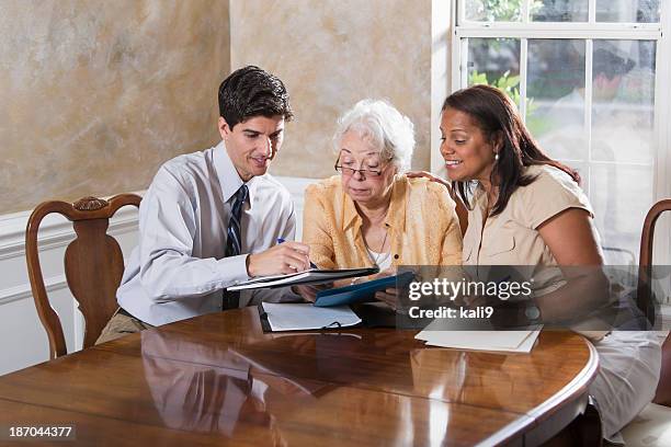 senior woman getting advice - elder law stock pictures, royalty-free photos & images