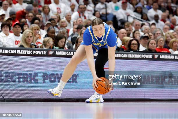 Lina Sontag of the UCLA Bruins controls the ball during the game against the Ohio State Buckeyes at Value City Arena on December 18, 2023 in...