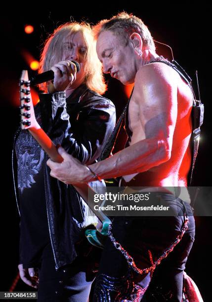 Joe Elliott and Phil Collen of Def Leppard performs at Sleep Train Amphitheatre on September 3, 2009 in Wheatland, California.