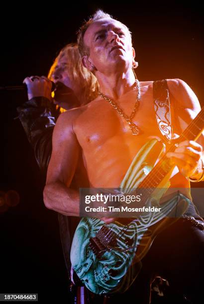 Joe Elliott and Phil Collen of Def Leppard performs at Sleep Train Amphitheatre on September 3, 2009 in Wheatland, California.