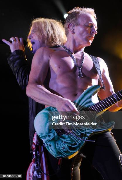 Joe Elliott and Phil Collen of Def Leppard performs at Sleep Train Amphitheatre on September 3, 2009 in Wheatland, California.