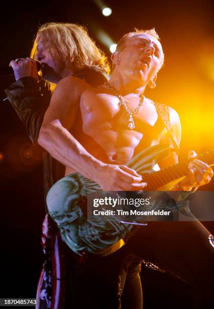 Joe Elliott and Phil Collen of Def Leppard performs at Sleep Train Amphitheatre on September 3, 2009 in Wheatland, California.