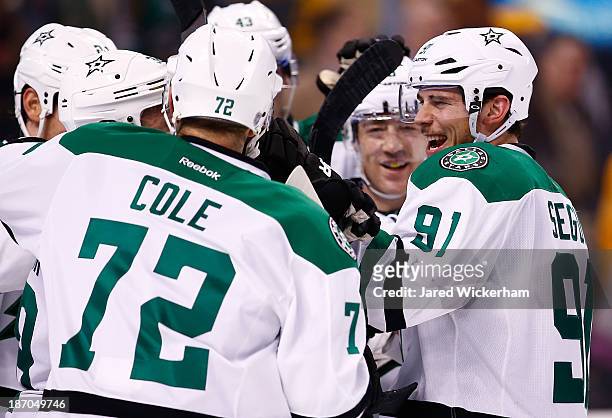 Tyler Seguin of the Dallas Stars celebrates with teammates following their shootout win against the Boston Bruins at TD Garden on November 5, 2013 in...