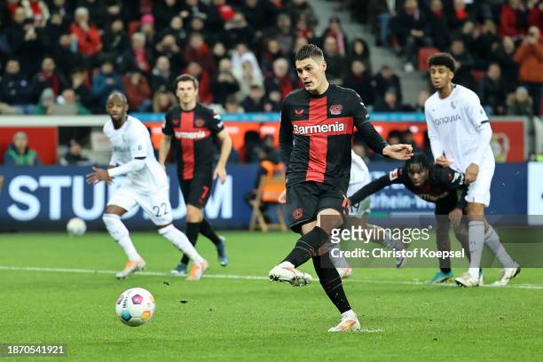 Patrik Schick of Bayer Leverkusen scores their team's first goal from the penalty spotduring the Bundesliga match between Bayer 04 Leverkusen and VfL...