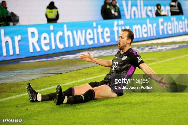 Harry Kane of Bayern Munich celebrates after scoring their team's second goal during the Bundesliga match between VfL Wolfsburg and FC Bayern München...
