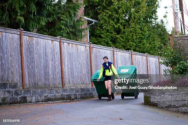 taking out the recycling - trash can stock pictures, royalty-free photos & images