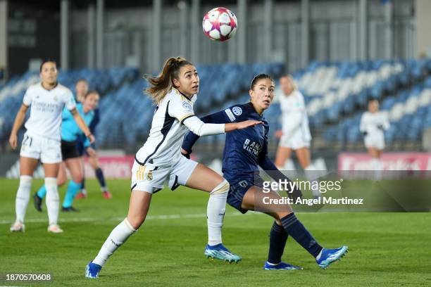 Olga Carmona of Real Madrid battles for possession with Clara Mateo of Paris FC during the UEFA Women's Champions League group stage match between...