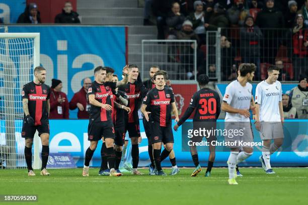 Patrik Schick of Bayer Leverkusen celebrates with teammates after scoring their team's third goal and his hat trick during the Bundesliga match...