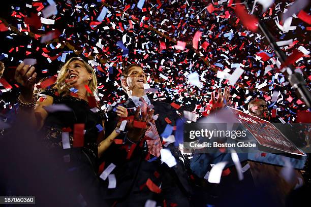 Marty Walsh celebrates with his longtime partner Lorrie Higgins at his Election Night party at the Park Plaza hotel in Boston, Nov. 5, 2013.